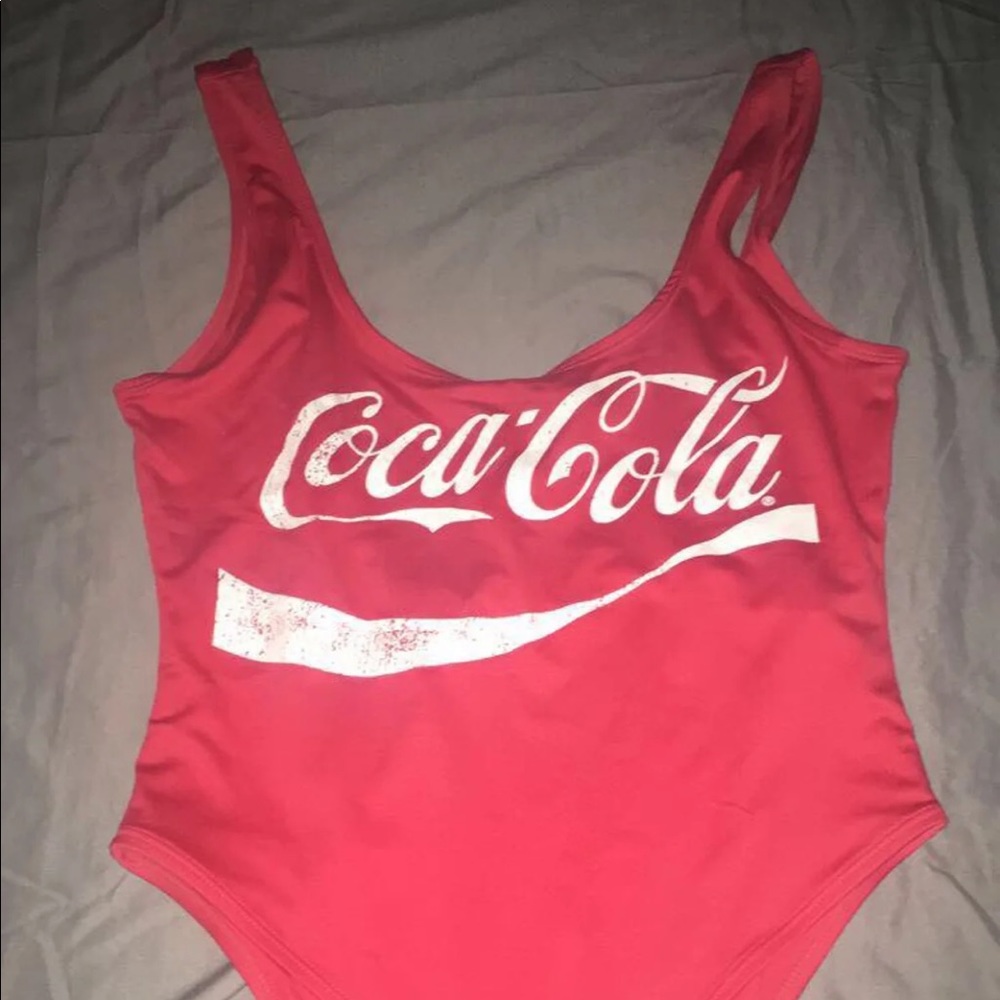 Coca Cola bodysuit size L with hat